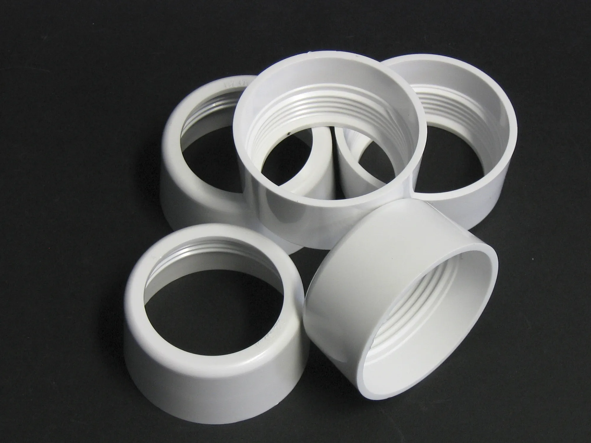 ZESTAW NAKRĘTEK MOCUJĄCYCH KOLANO SPUSTOWE (5 szt.), biały